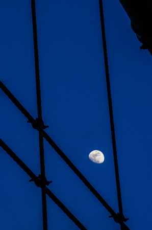 The moon and Brooklyn Bridge
